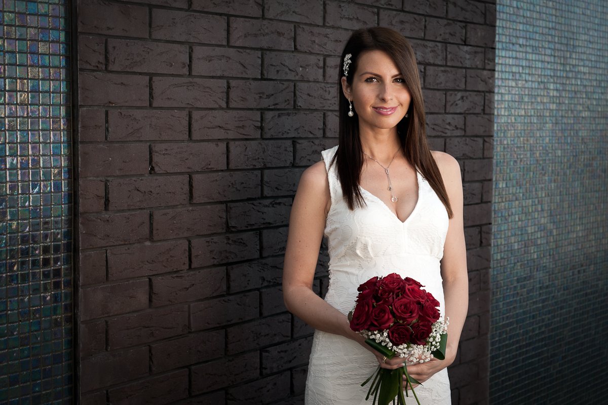 a bride with flowers with simple background
