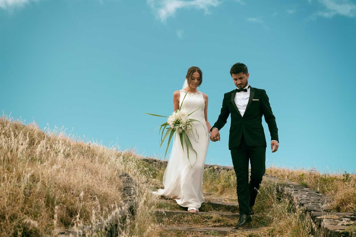 Bride and groom walking together