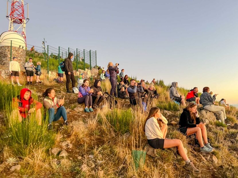 Crowded place at sunrise at Areiro Peak