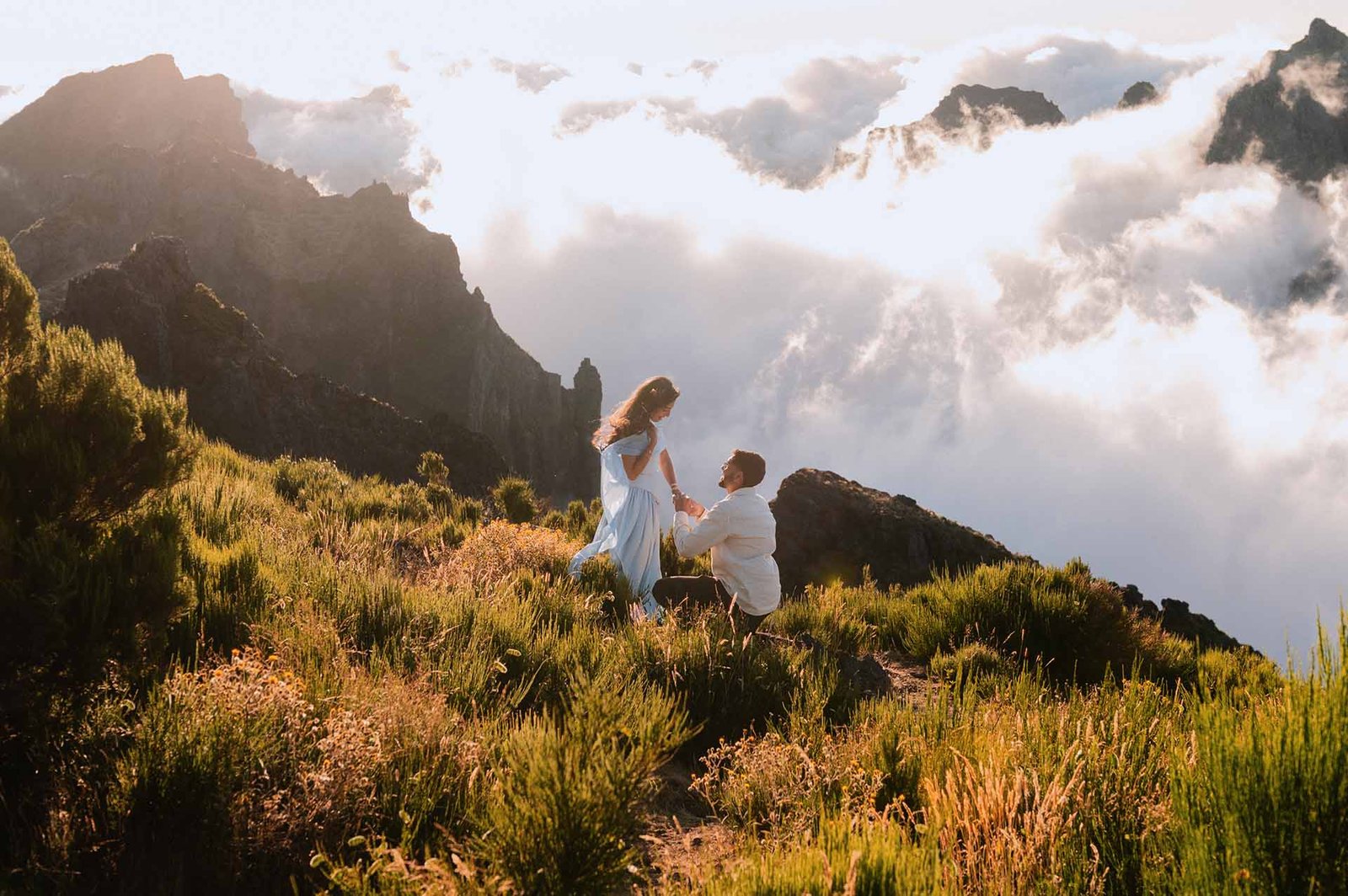 Secret marriage proposal in Madeira mountains shot from the distance.