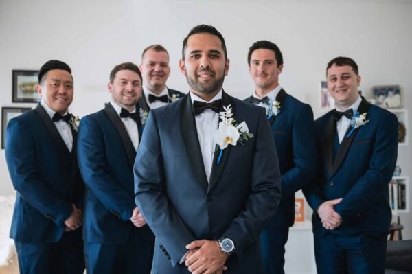 photo of groom and groomsmen before the wedding