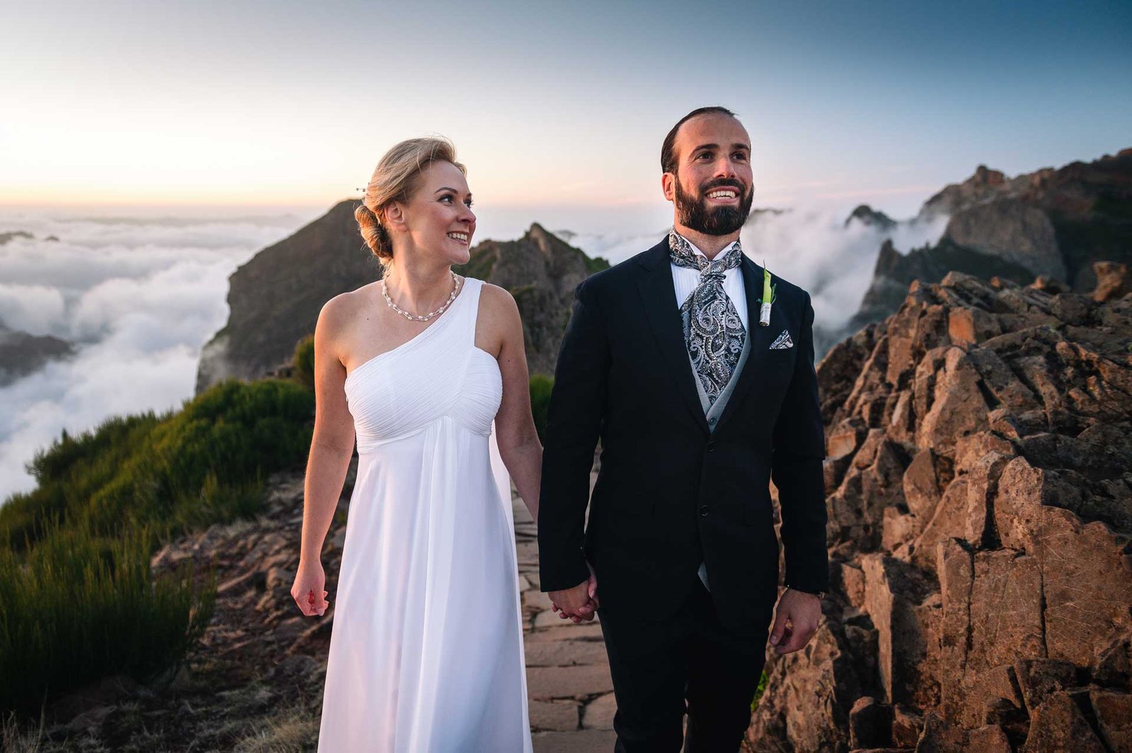 newlywed couple walking