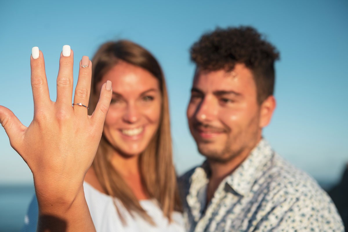 future bride shows a proposal ring